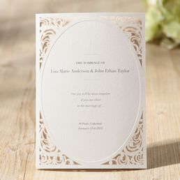 Classic trifold card with an intricate laser cut border framing an oval embossed center covering the main invite printed in raised ink
